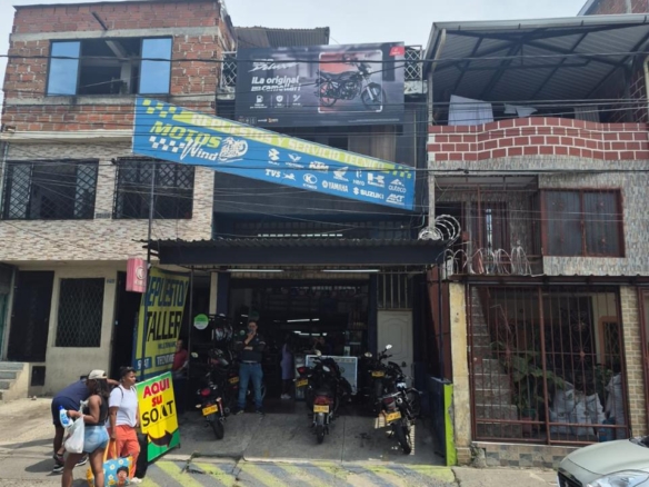 Casa de tres pisos con local comercial en venta – Avenida Simón Bolívar, Cali