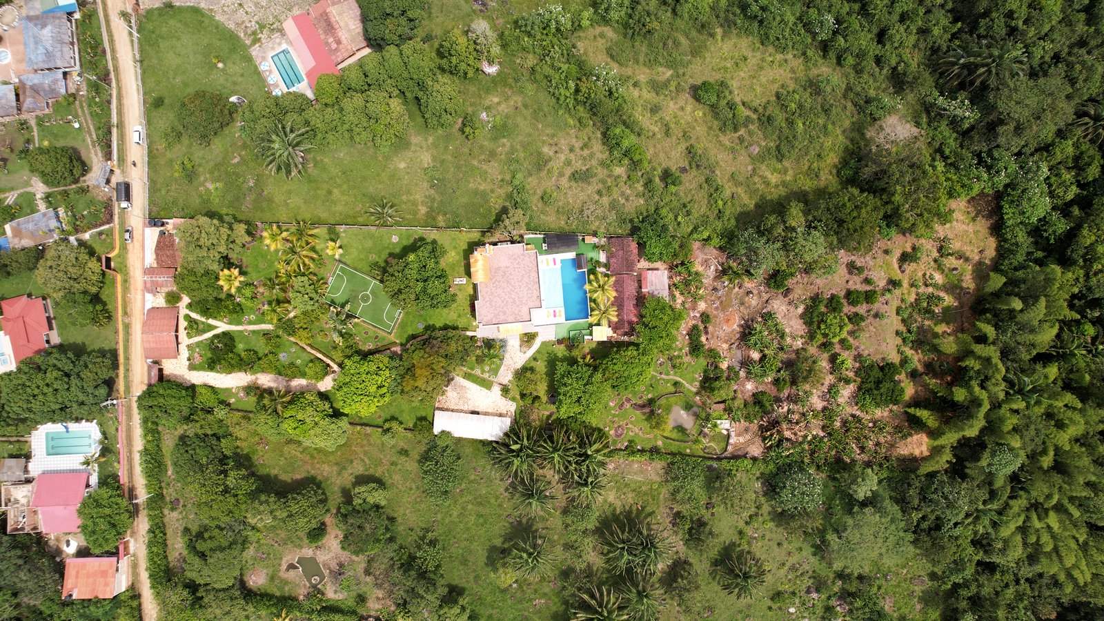 01 DJI_0009 Finca en Venta en Melgar de 15.000 m² con Piscina, 4 Cabañas y Excelente Potencial Turístico