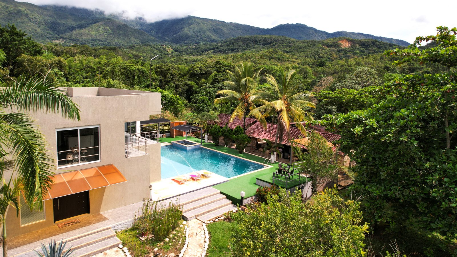 03 DJI_0038 Finca en Venta en Melgar de 15.000 m² con Piscina, 4 Cabañas y Excelente Potencial Turístico